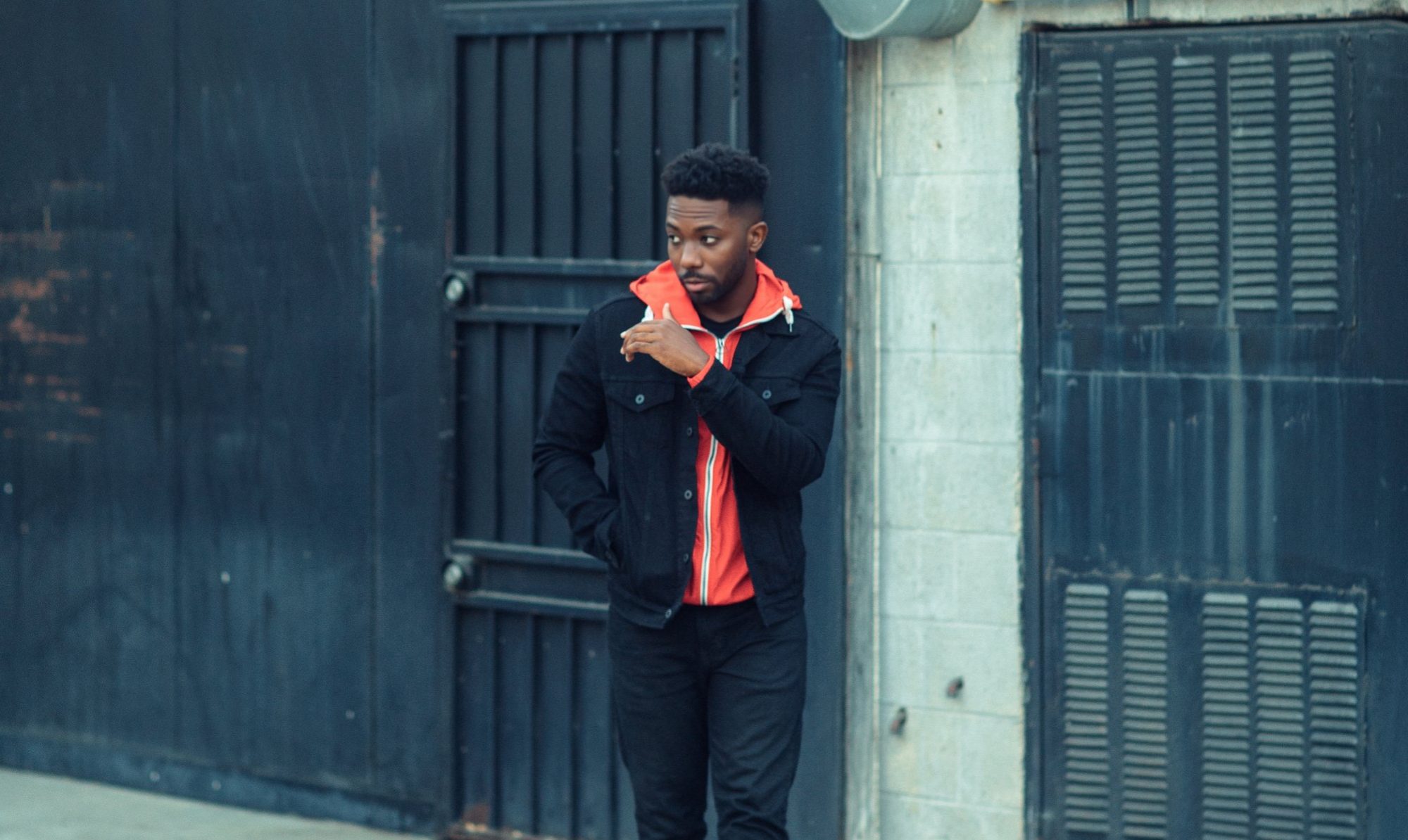 Actor Dennis Pearson walking on the street